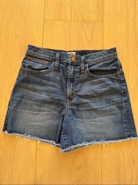 J. CREW!Denim jean shorts with pockets and zip front and frayed hemline.Size 28.
